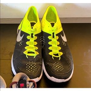 Neon and black Nike running shoes